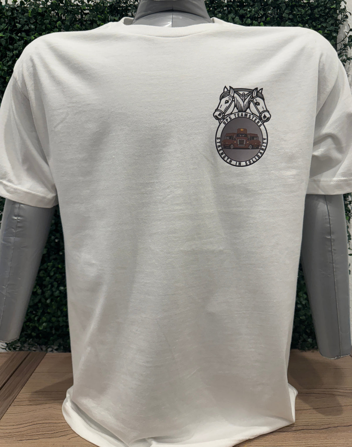 UPS Teamster & Package Car Tee with Teamster logo and UPS Package Car design on display.